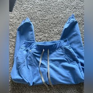 Blue figs jogger bottoms. Smoke free home. Good condition.